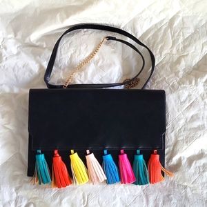 Ladies leather envelope purse, snap closure, zipper pocket inside, tassels